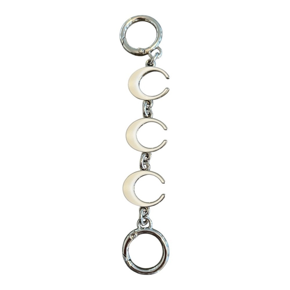 Purse  chain extender for straps with white C’s. Unbranded NWT